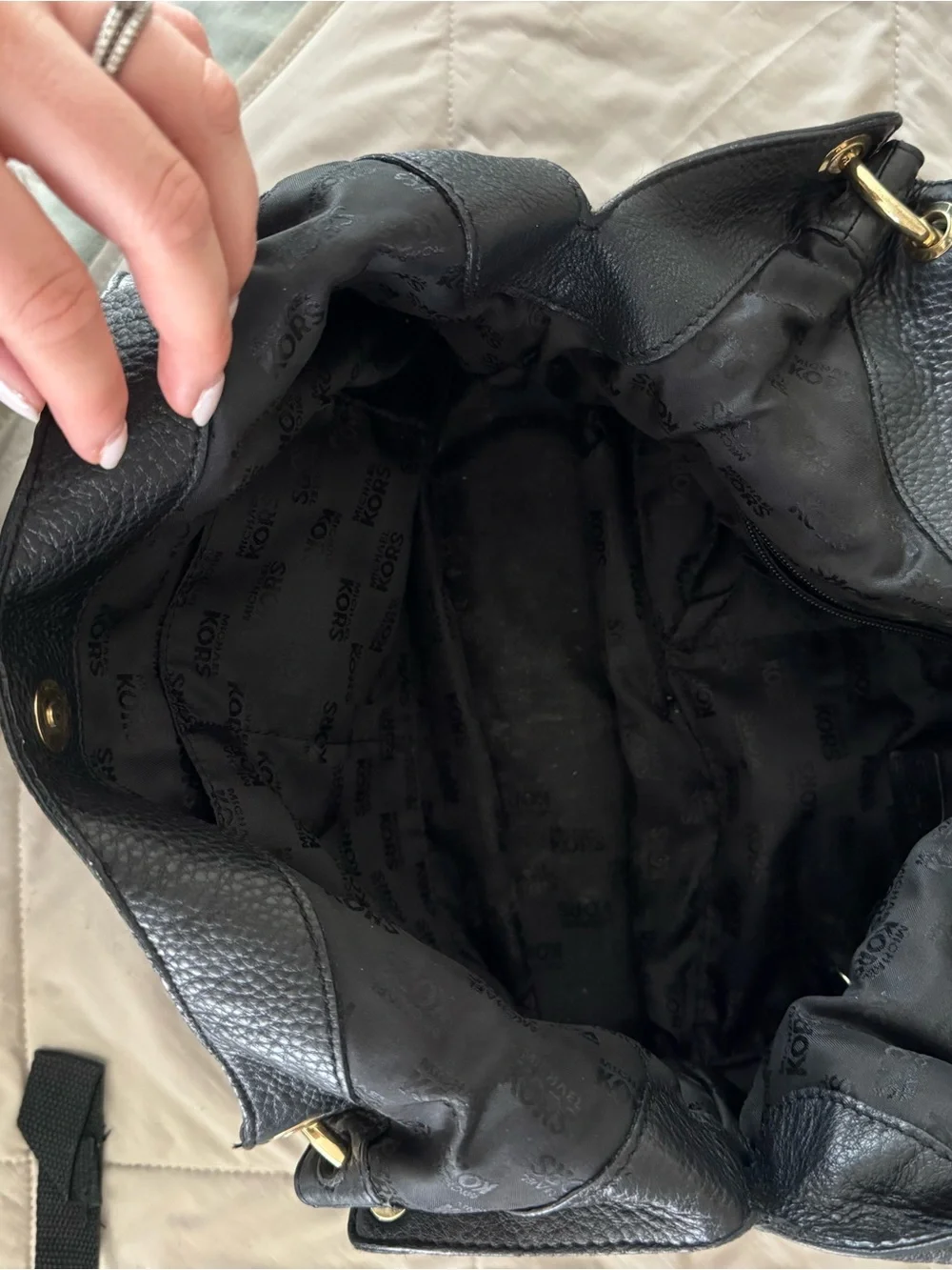 Michael Kors Black Leather purse with Tassel Charm